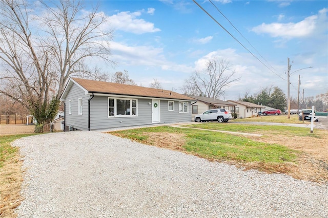 view of front of home with a front lawn