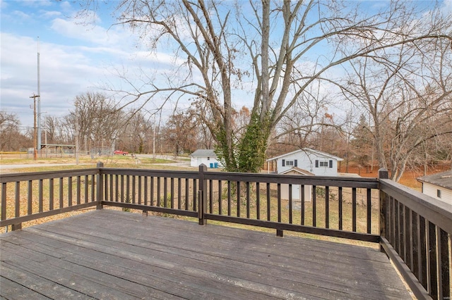 wooden deck with a yard