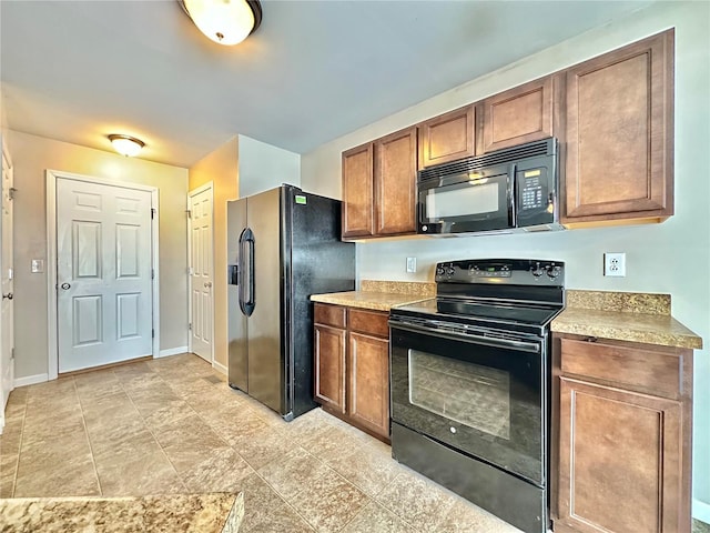 kitchen with black appliances