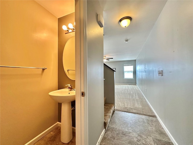 bathroom with ceiling fan