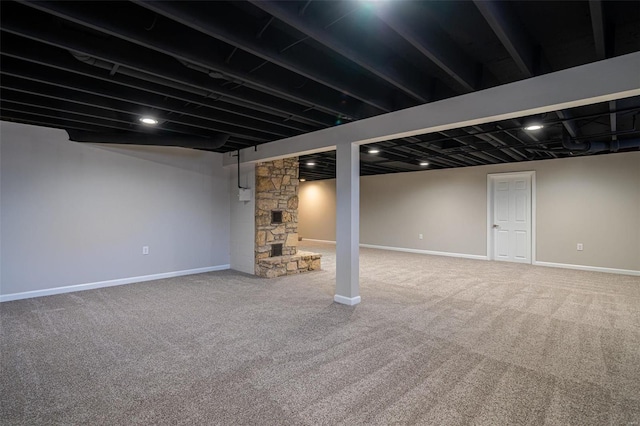 basement featuring carpet