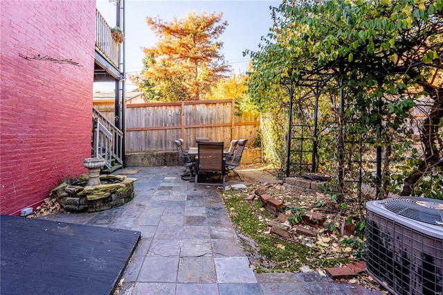 view of patio with central air condition unit