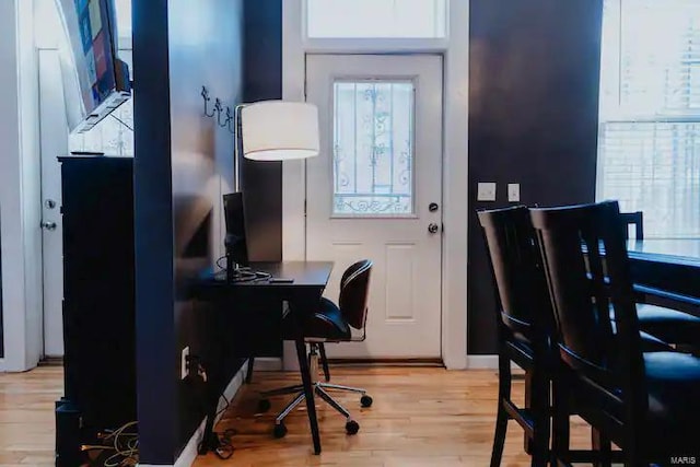 office area with light hardwood / wood-style flooring