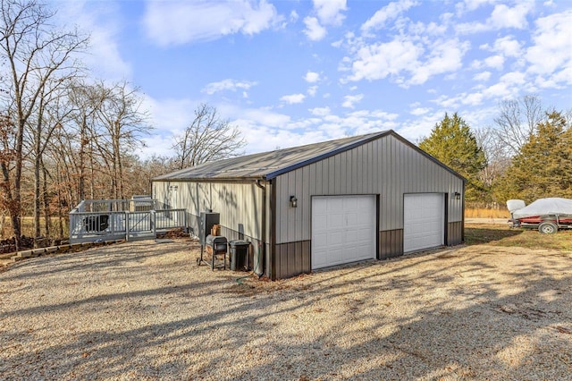 view of outbuilding featuring a garage