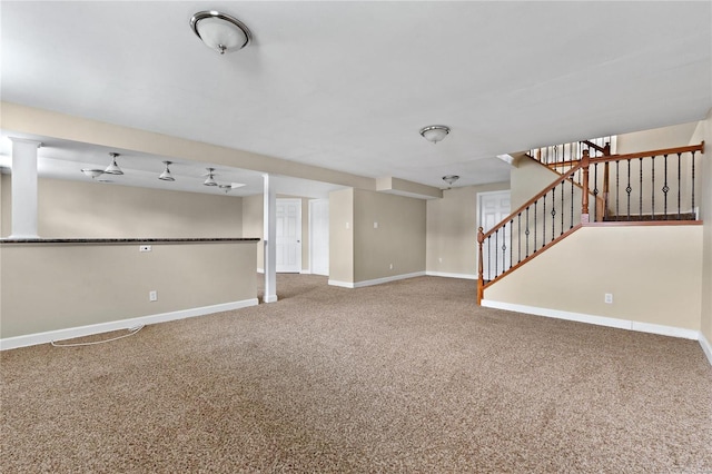 unfurnished living room featuring carpet flooring