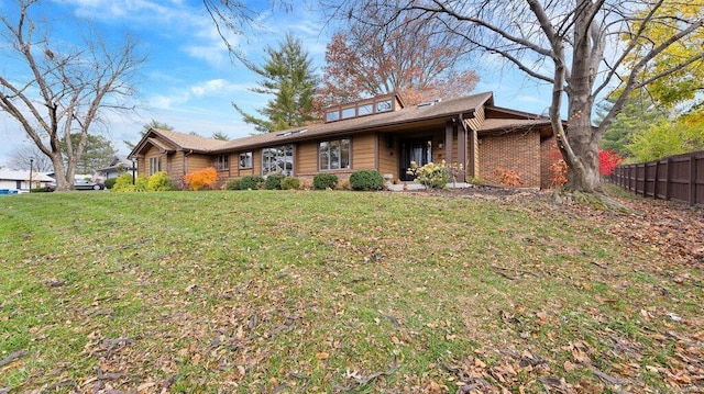 view of front facade with a front lawn