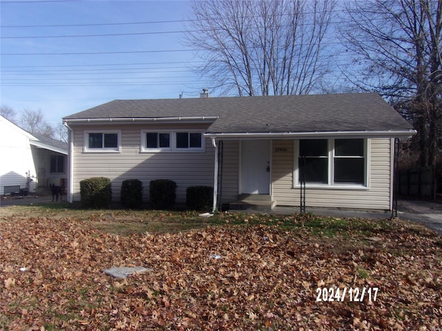 ranch-style home with covered porch