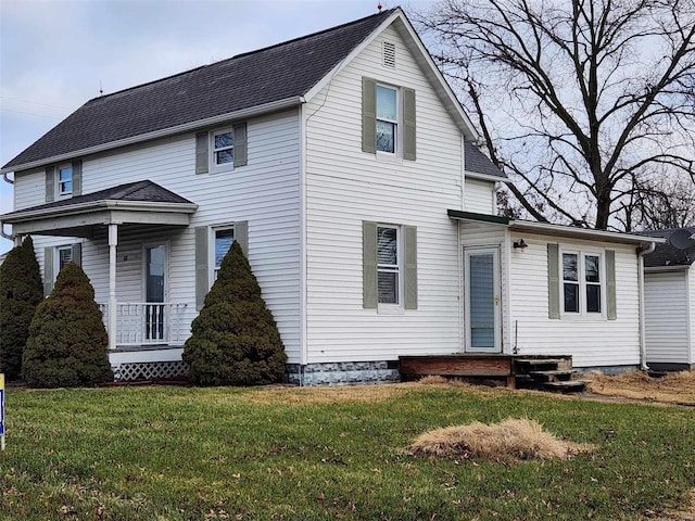 view of front of property featuring a front yard