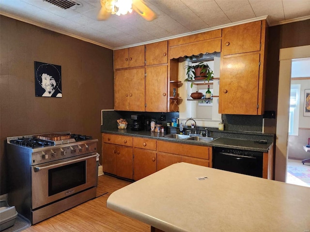 kitchen with sink, high end stainless steel range oven, black dishwasher, crown molding, and light hardwood / wood-style floors