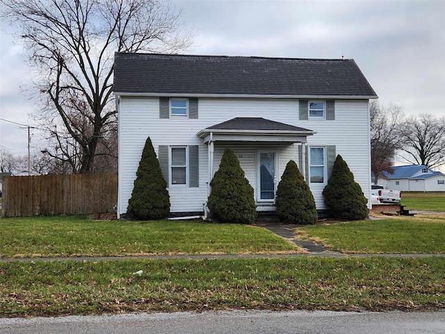 view of front facade featuring a front yard