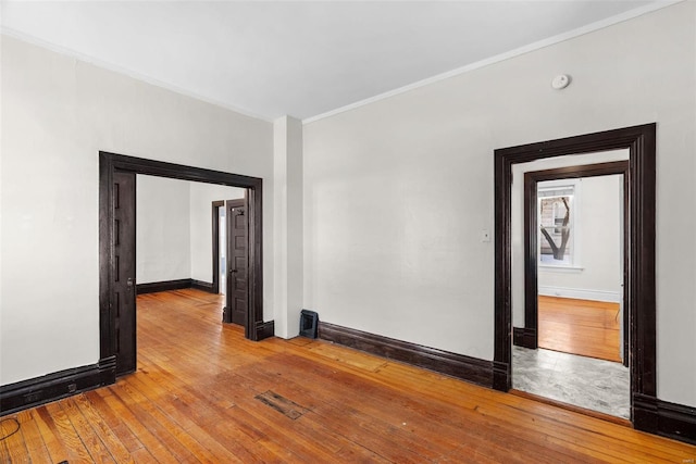 empty room with wood-type flooring