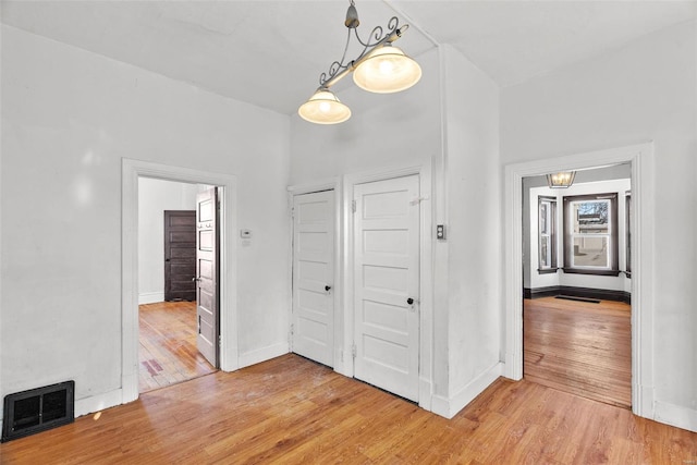 hall featuring wood-type flooring