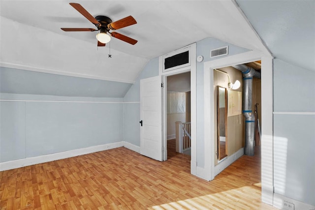 bonus room featuring lofted ceiling, light wood-type flooring, and ceiling fan