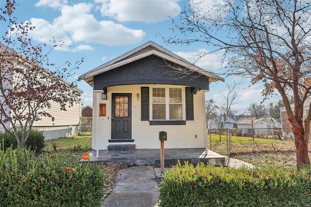 bungalow-style home featuring covered porch