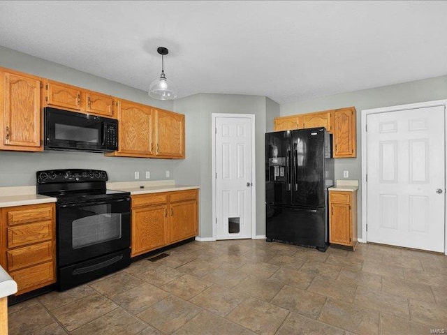 kitchen with decorative light fixtures and black appliances