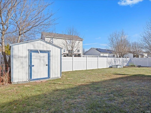 view of outbuilding featuring a lawn