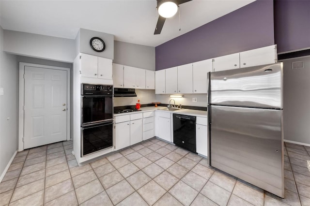 kitchen with ceiling fan, sink, black appliances, light tile patterned floors, and white cabinetry