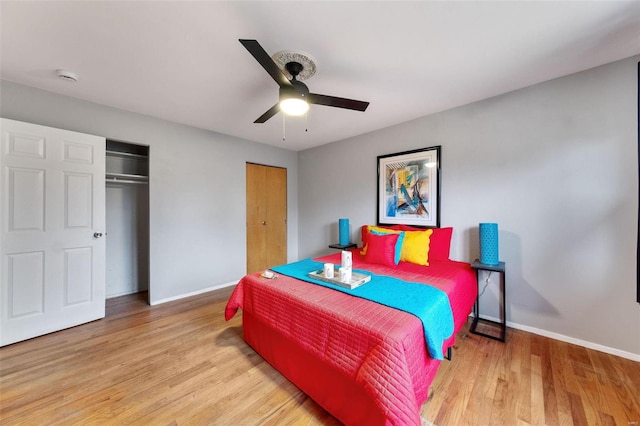 bedroom featuring light wood-type flooring and ceiling fan