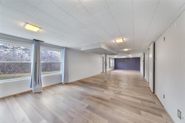 basement featuring light hardwood / wood-style floors