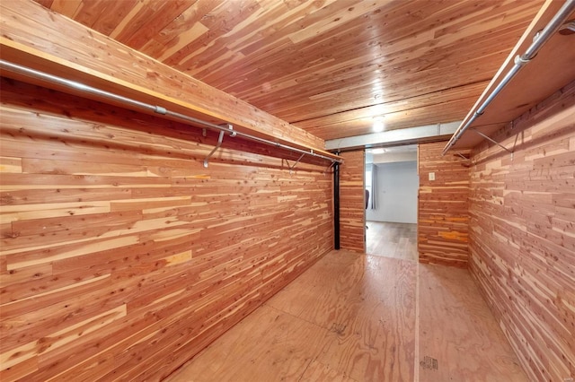 walk in closet featuring hardwood / wood-style flooring