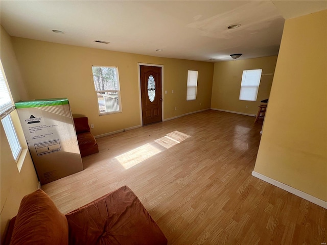 entrance foyer featuring light wood-type flooring