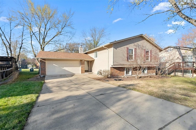 split level home with a front lawn