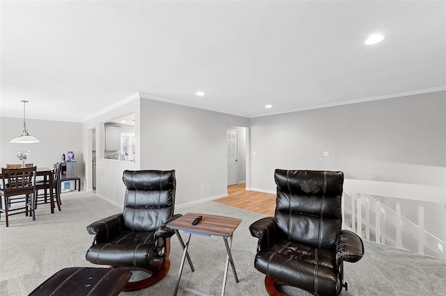 carpeted living room featuring crown molding