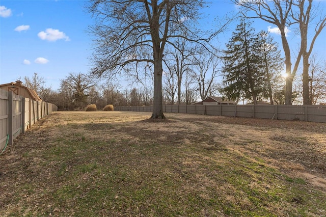 view of yard featuring a fenced backyard