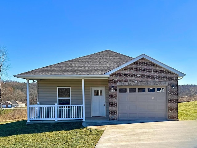 view of front facade featuring covered porch, a garage, and a front lawn