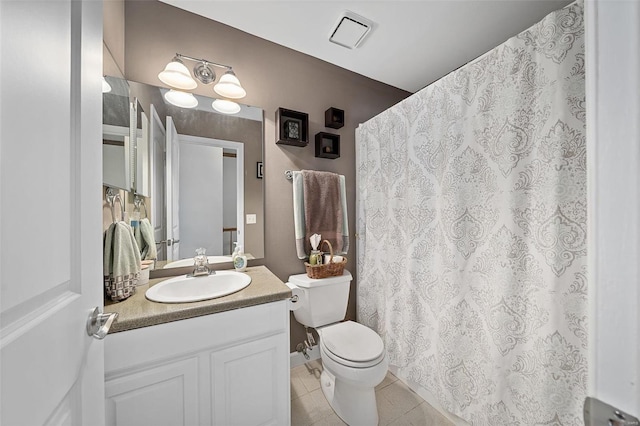 bathroom with visible vents, toilet, a shower with shower curtain, tile patterned floors, and vanity