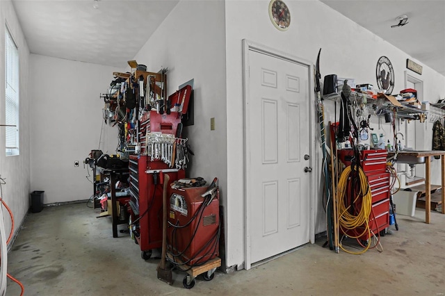 garage with a workshop area