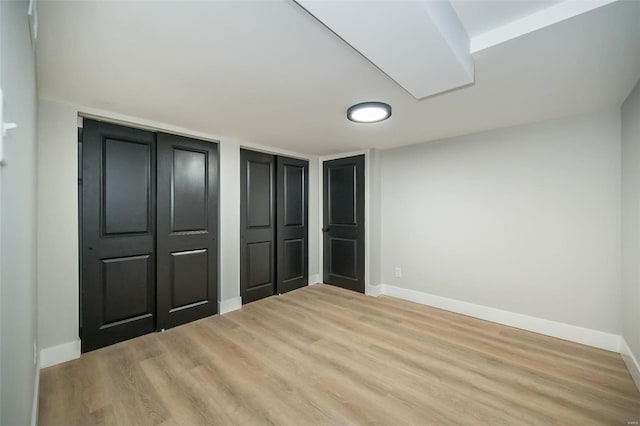 unfurnished bedroom featuring light hardwood / wood-style flooring