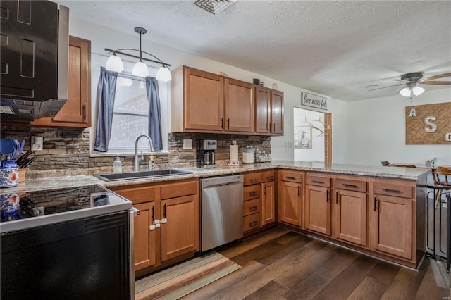 kitchen with a peninsula, a sink, decorative backsplash, dark wood-type flooring, and stainless steel dishwasher