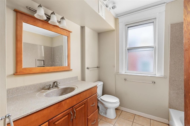 bathroom with tile patterned floors, vanity, and toilet