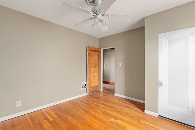 unfurnished bedroom featuring light hardwood / wood-style flooring and ceiling fan