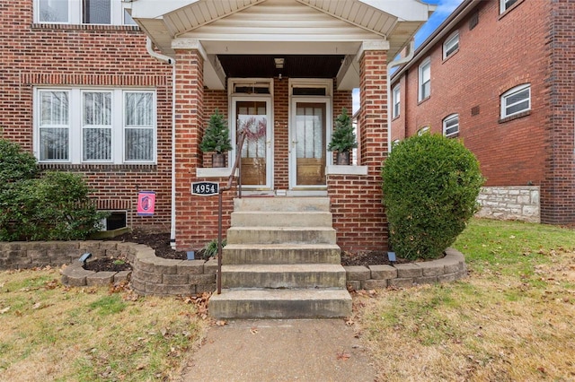 doorway to property featuring a porch