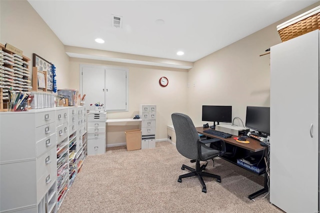 office area featuring light colored carpet