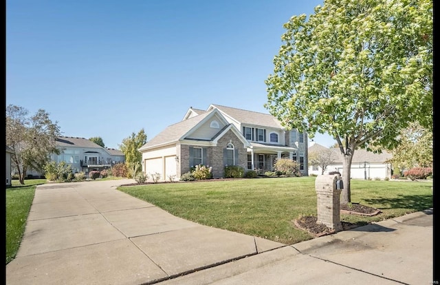 view of front property featuring a garage and a front lawn