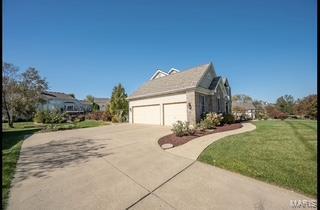 view of home's exterior with a yard