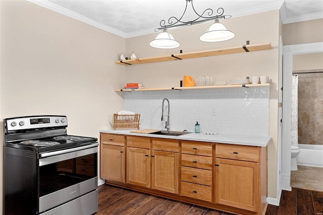 kitchen featuring electric range, sink, hanging light fixtures, dark hardwood / wood-style floors, and crown molding