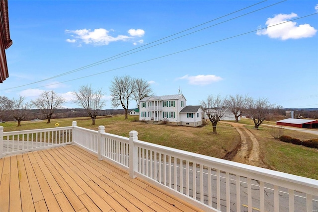 deck featuring a yard