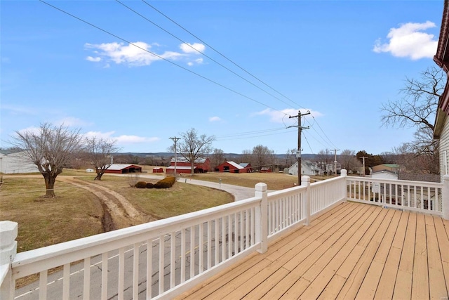 deck featuring a yard