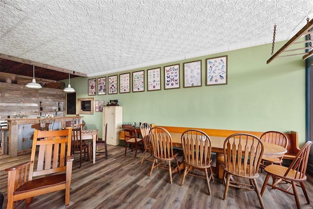 dining area with hardwood / wood-style flooring