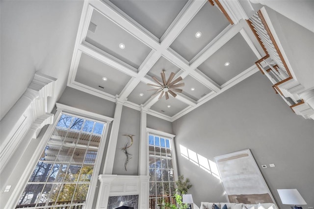 details with coffered ceiling, beam ceiling, and ornamental molding