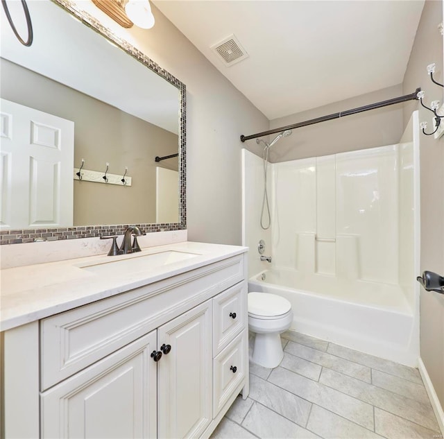 full bathroom with shower / tub combination, vanity, toilet, and backsplash