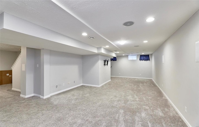 basement with light carpet