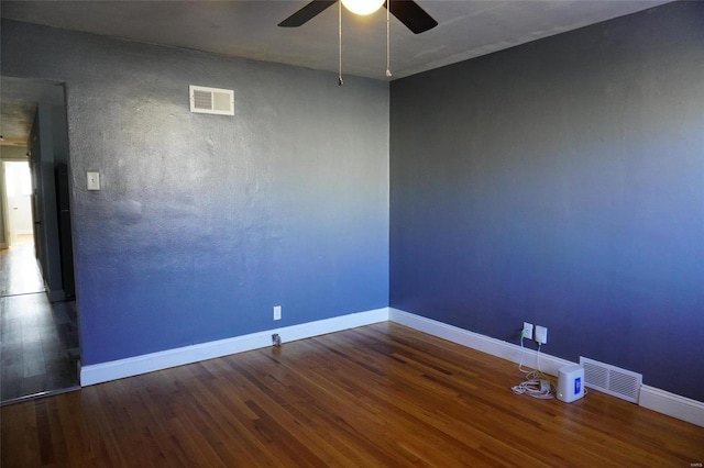 unfurnished room with hardwood / wood-style flooring and ceiling fan