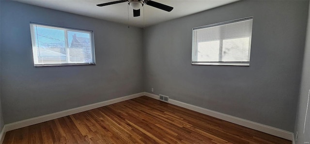 unfurnished room with ceiling fan and wood-type flooring