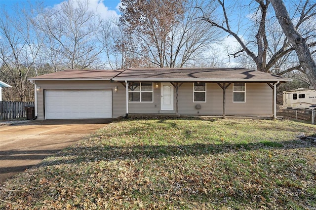 ranch-style house featuring a garage and a front lawn