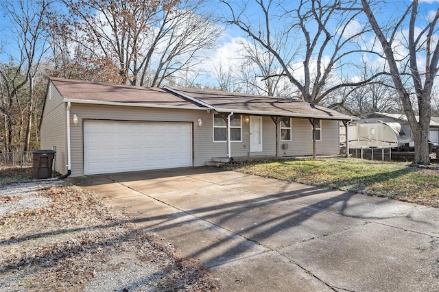 ranch-style house featuring a garage